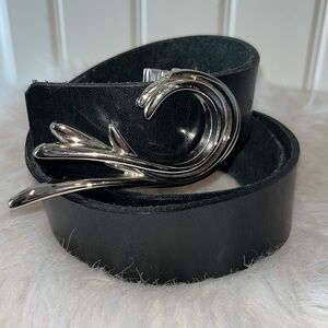 Smooth black leather belt High quality obscure brand 
unique silver tone buckle